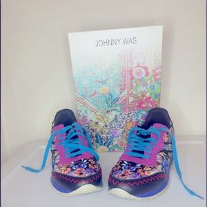 These are a darling floral-embroidered colorful worn once set of sneakers.